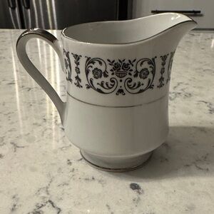 Vintage Royal Song China Creamer with silver trim. Black intricate design